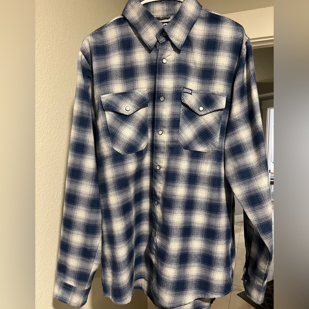 Dixxon blue and white flannel. Pet/smoke free home! Never put in dryer.